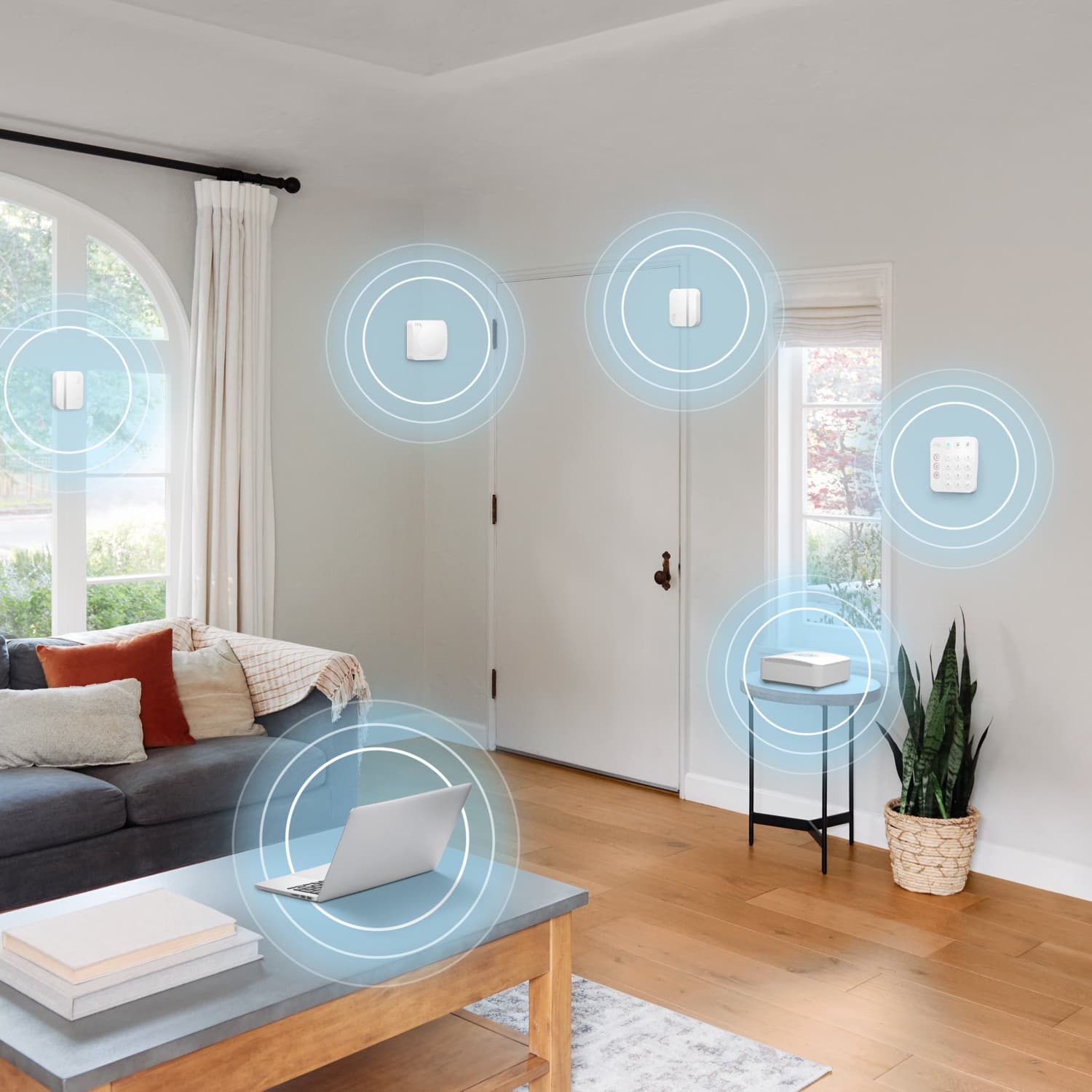 Alarm Security Kit, 8-Piece (2nd Generation) - Modern living room with Ring Alarm Security Kit devices highlighted, showing connected sensors, keypad, and base station.