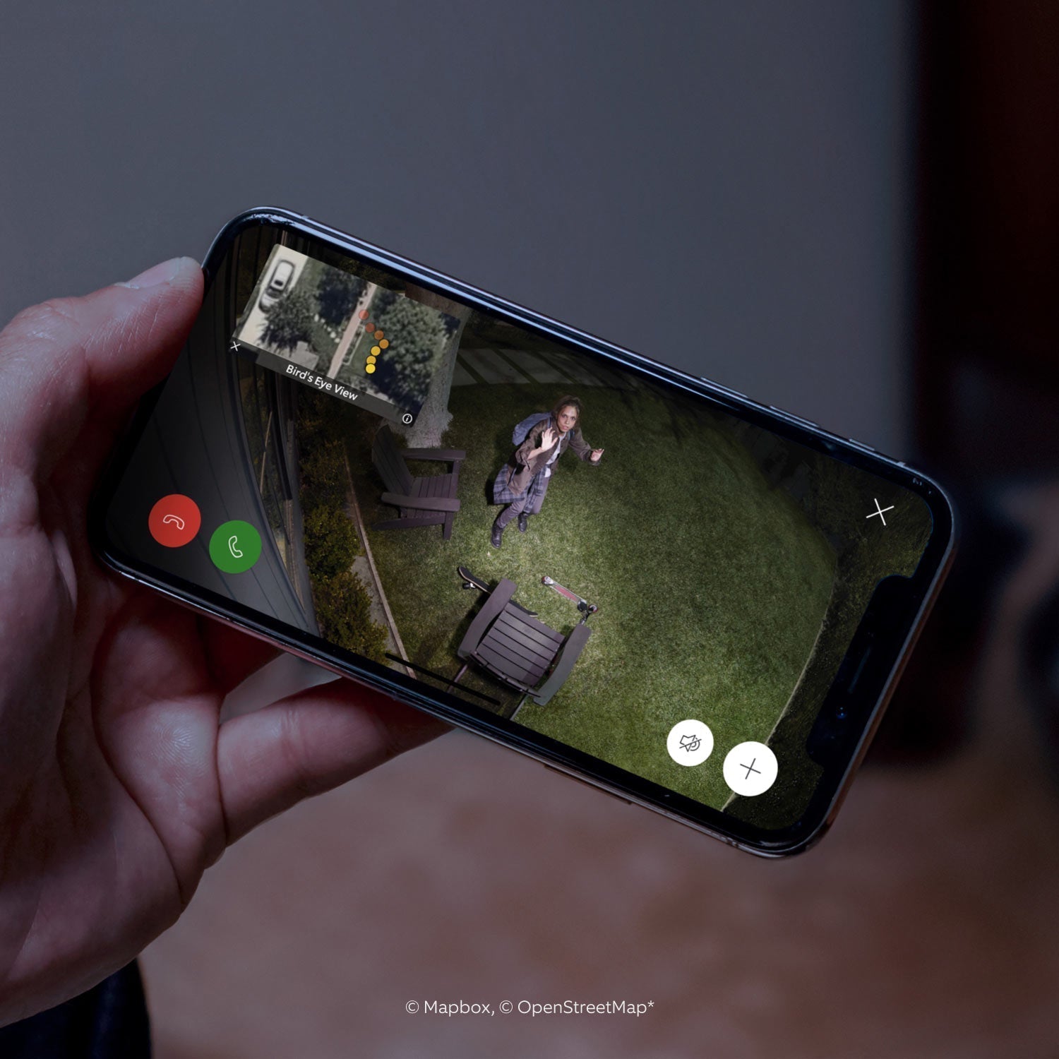 Spotlight Cam Pro (Featuring Retinal 2K) - Plug-In:Live Spotlight Cam Pro feed of waving woman at night, with Bird's Eye View, call controls, and person's path. 