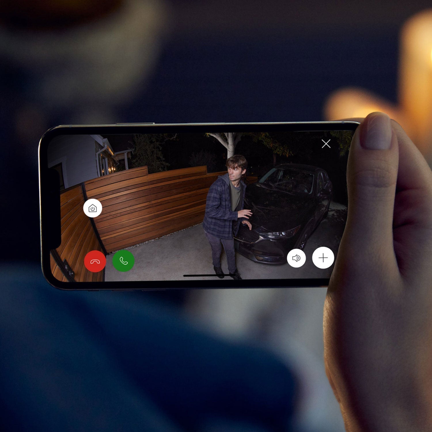 Spotlight Cam Plus - Plug-In:Live Ring Spotlight Cam Plus footage of suspicious person near car at night, with app controls visible.
