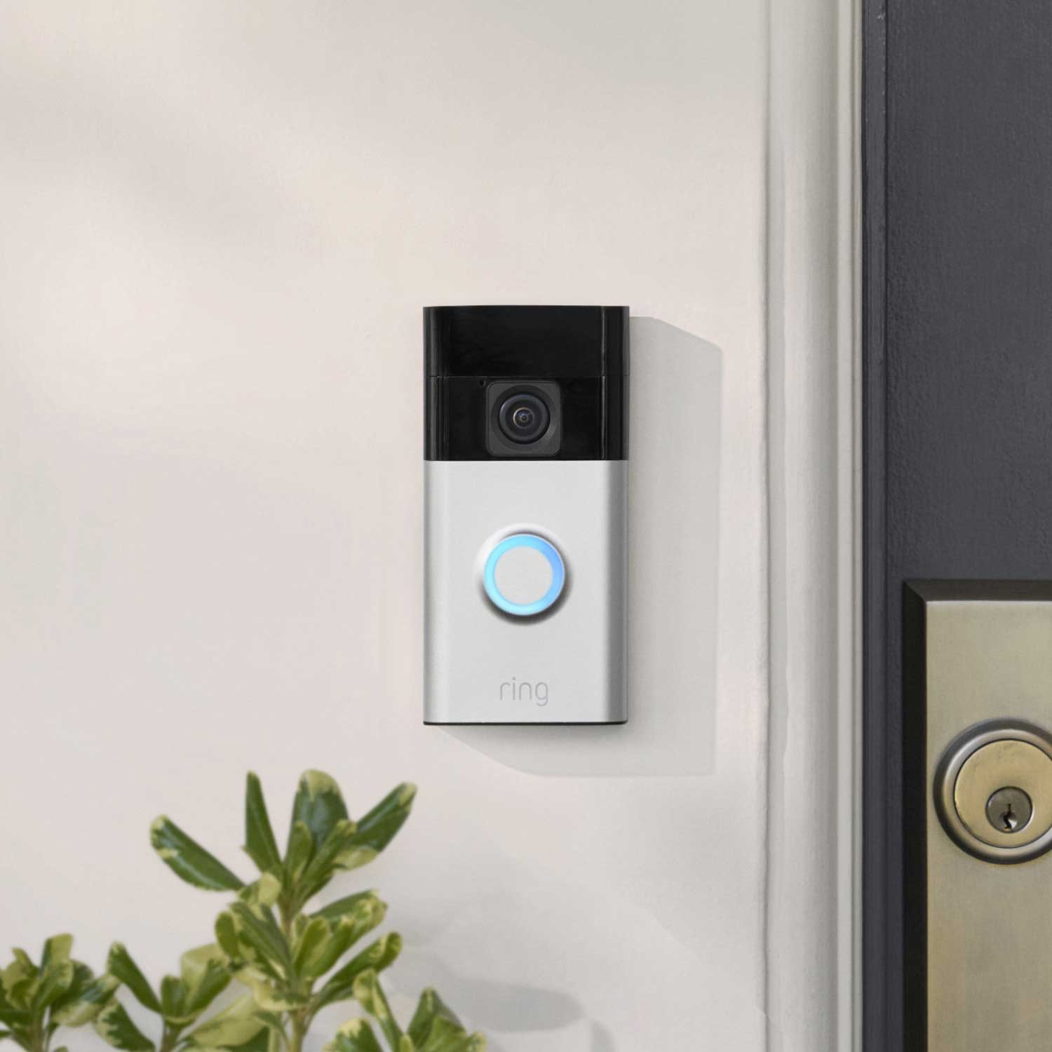 Whole Home Basic Kit (Outdoor Cam Plus Battery + Battery Doorbell + Alarm Security Kit, 5-Piece) - Battery Doorbell in Satin Nickel mounted next to a door.